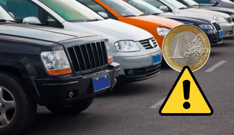 Auto parcheggiate e monetina (Depositphotos foto) - www.rally.it