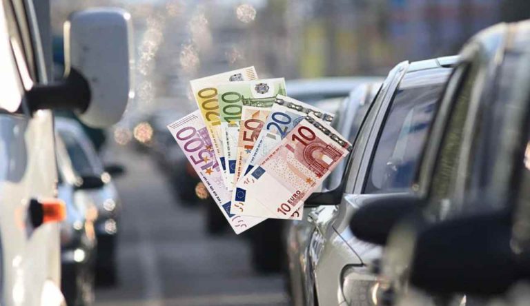 Traffico e soldi (Depositphotos foto) - www.rally.it